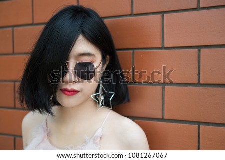 Portrait of beautiful asian chic girl pose for take a picture,Lifestyle of teen thailand people,Modern woman happy concept