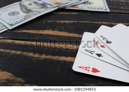 casino, real money. on the table money (dollars), playing cards