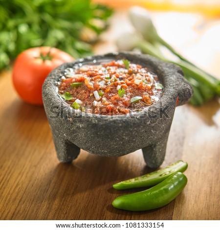 mexican sauce and ingredientes
 Royalty-Free Stock Photo #1081333154