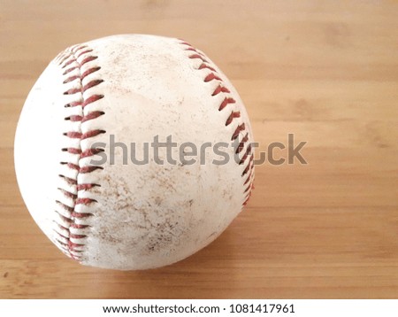 Baseball on Wood Table