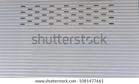 Straight line background texture of the steel door.