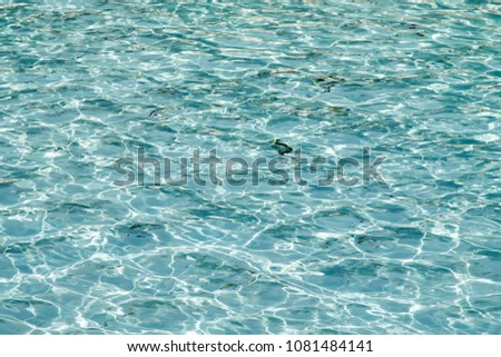 water in the pool of blue ripples, background