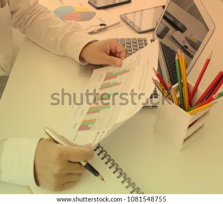 Businessman in the office / Businessman looking at graph/ vintage light
Data, Asian and Indian Ethnicities, Graph, Chinese Ethnicity, Chart 