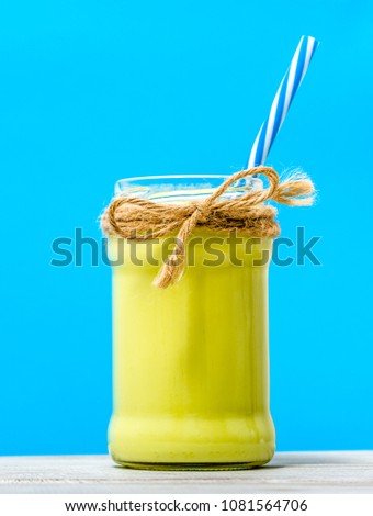 Jar of smoothie with avocado or green milk shake, healthy diet concept