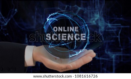 Painted hand shows concept hologram Online science on his hand. Drawn man in business suit with future technology screen and modern cosmic background