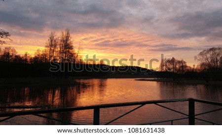 River in the background of a beautiful sunset