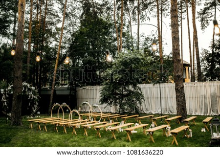 Wood wedding ceremony at summer