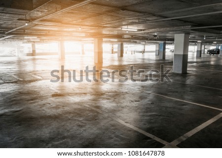 interior of empty vacant car parking garage space in shopping mall department store