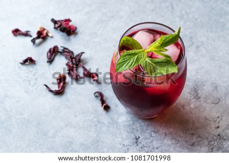 Cold Brew Hibiscus Tea with ice and Mint Leaves. Royalty-Free Stock Photo #1081701998