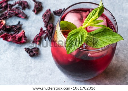 Cold Brew Hibiscus Tea with ice and Mint Leaves. Royalty-Free Stock Photo #1081702016