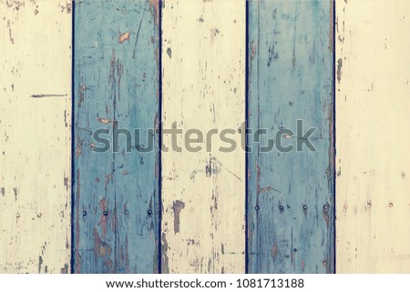 Vintage background wooden texture for design and creativity can be used as cover for brochures or wallpapers. White and blue combination of old wooden boards with chipped paint
