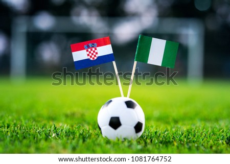Croatia - Nigeria, Group D, Saturday, 16. June, Football, World Cup, Russia 2018, National Flags on green grass, white football ball on ground.