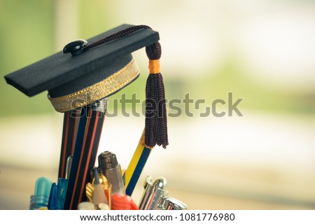 Graduate study or Education knowledge is power concept: Graduated cap Put on color pencil in basket. Conceptual for Educational is successs study or business world. Back to School ideas. Royalty-Free Stock Photo #1081776980