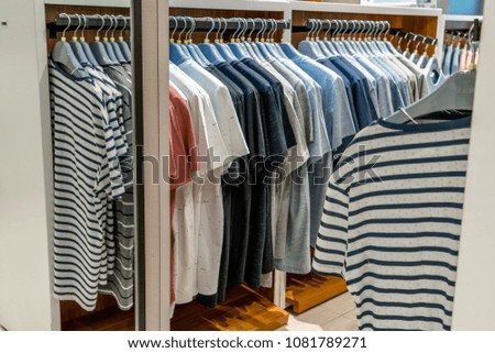 Clothes on store shelves.