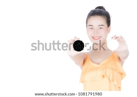 Woman holds the product for presentation. Lady  beautiful  in white shirt girl advertising your product on blank white sign board. Asian female model isolated on white background.