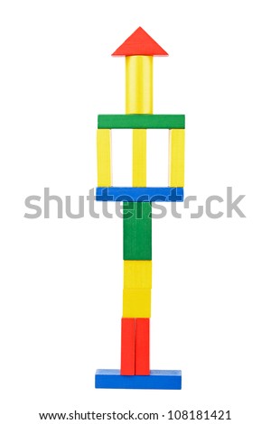 Tower made from wooden toy blocks on white background