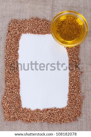 Frame made of buckwheat on canvas