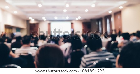 blurred people sitting at the conference Royalty-Free Stock Photo #1081851293