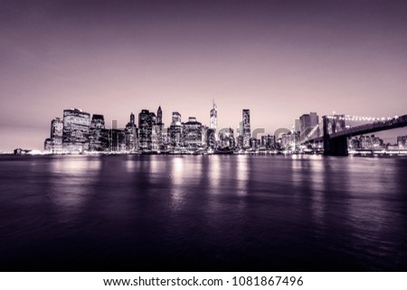 Manhattan skyline. New York city. USA. Panoramic view with pink tones.  