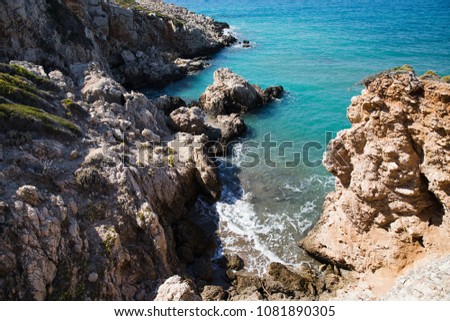 high angle view of rocky sea coast and waves at sunny day, fethiye, turkey