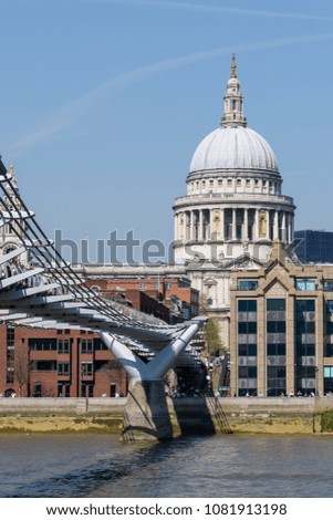 Millenium bridge and St Pauls Cathedral as seen from the south bank of the Thames.