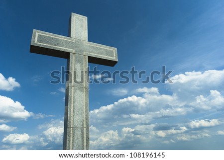 marble cross on the hill, blue sky and clouds, Budapest, Hungary