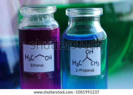 Ethyl and isopropyl alcohols, colored in purple and blue colors. They are used as solvents. Royalty-Free Stock Photo #1081991237