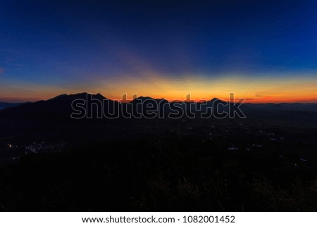 Sky and mountains after sunrise in Kanchanaburi, Thailand.