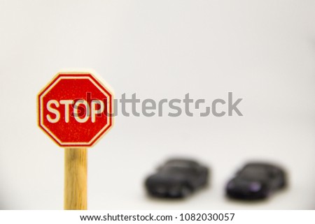 Traffic signs and children's car Travel Security Concept.