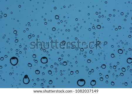 Water drops on windscreen dusty