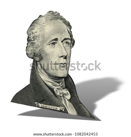 First Secretary of Treasury Alexander Hamilton. Qualitative portrait from 10 dollars banknote isolater white background. Photo at an angle of 15 degrees, with a shadow.
