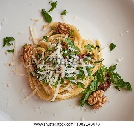 Spaghetti Rucola pomodoro Royalty-Free Stock Photo #1082143073