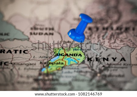 Map of Uganda with a blue pushpin stuck