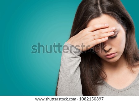 Young woman having a headache