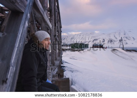  norway landscape nature of the mountain of Spitsbergen Longyearbyen  Svalbard  explorer  man  arctic winter  polar day sunset
