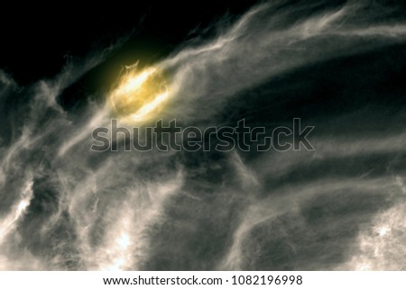 sky and moon with black and white cloud textured background
