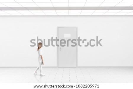 Woman stand near blank name plate design mockup hanging on door. Metal door sign mock up template on entry in cabinet. Office hall interior with glass nameplate on door. Clear closed door signage 