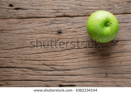 Top view of Fresh Green Apple on Wood background and copy space