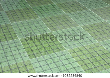 pattern of sidewalk green stone floor tile seamless background and texture