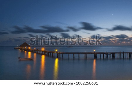 A view of a pier on an island