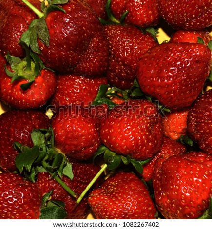 many strawberries with tail