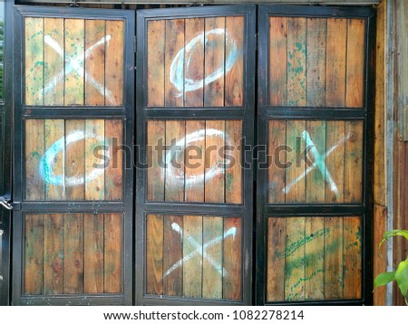 Loft style Wood Wall with X O Drawing texture background
