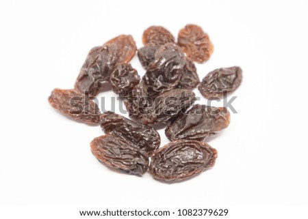Dried small raisin Royalty-Free Stock Photo #1082379629