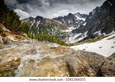 Spring landscape in the Tatra Mountains, view of the highest peak of Poland - Rysy.