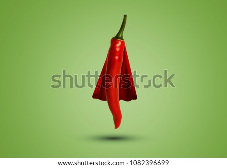 Spicy Chili Pepper dressed up as a Superhero with Red Cape. Hot Jalapeno 
 Cartoon Character.