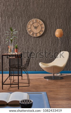 Modern study and work room interior concept with clock chair and vase of flower design. Home study and work shop decoration.