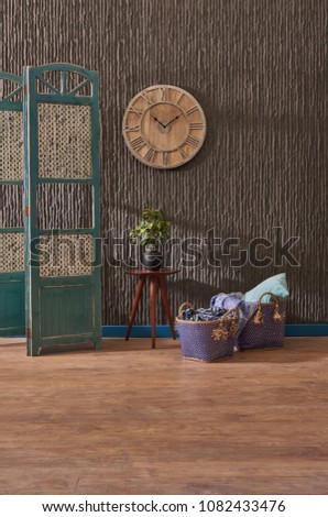 Modern metal wall concept interior with clock paravane and chair concept.