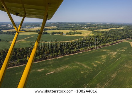 Aerial view of farm fields and trees in mid-west Missouri early morning
