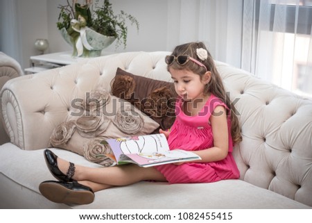 kid girl reading book