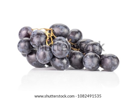Black grape cluster (autumn royal variety) isolated on white background seedless sweet smooth purple berries
